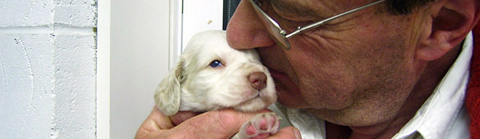 James Darley with Clumber puppy in hand